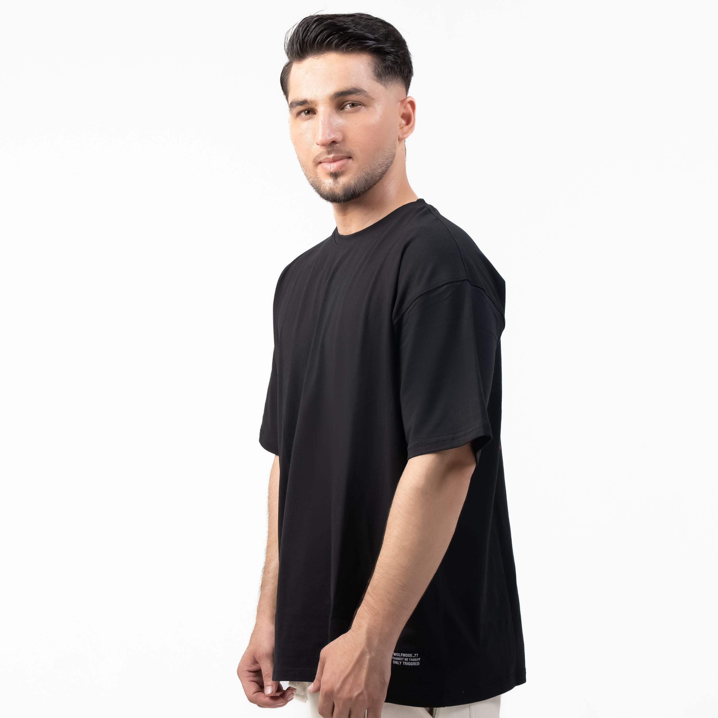 WOLFMODE_77 OVERSIZED TEE — WAR BLACK — back view