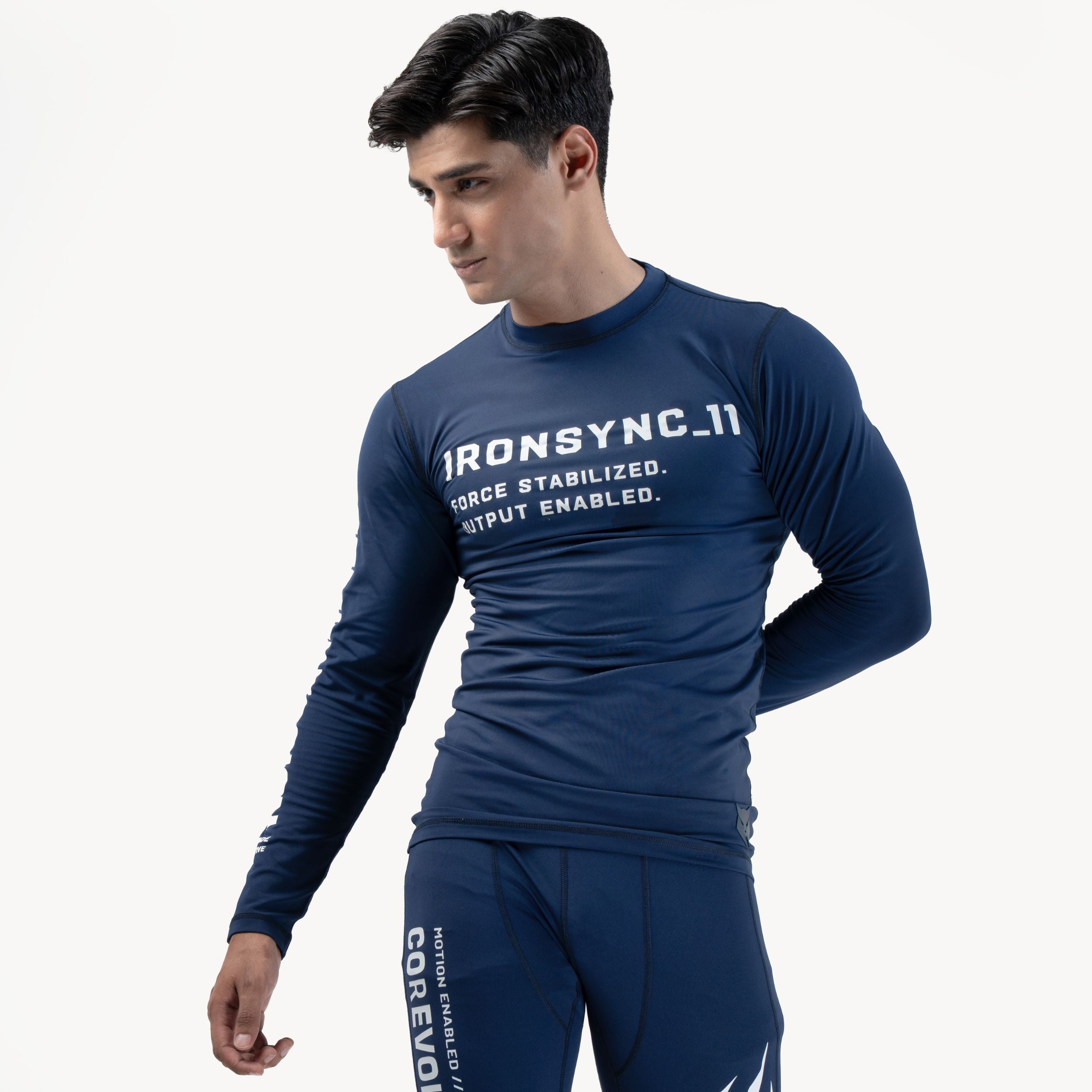 Ironsync_11 - Shadow Navy — Front ¾ angle, navy compression top with matching leggings