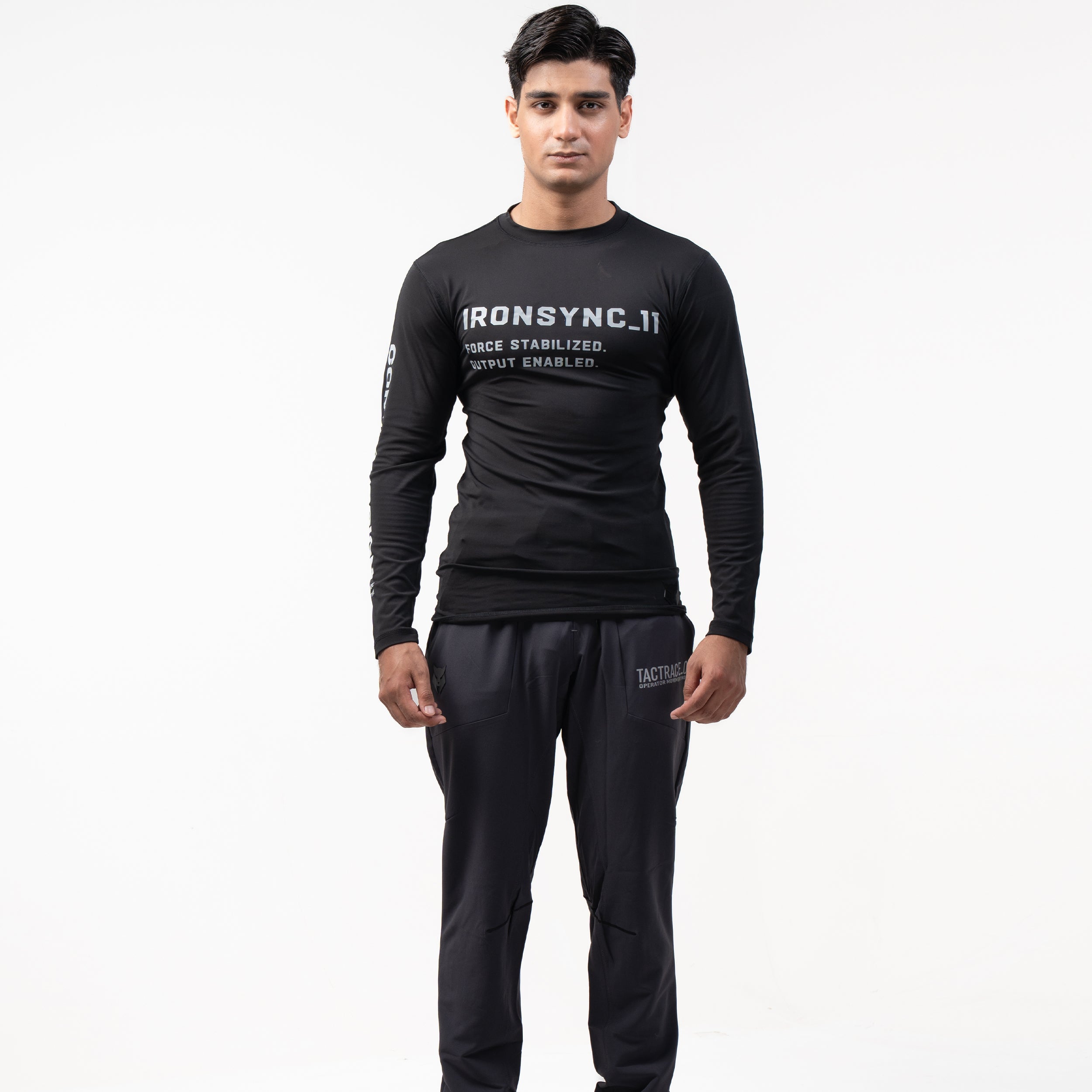 Ironsync_11 - war black — Full-body front view, black compression top paired with dark tactical cargo pants