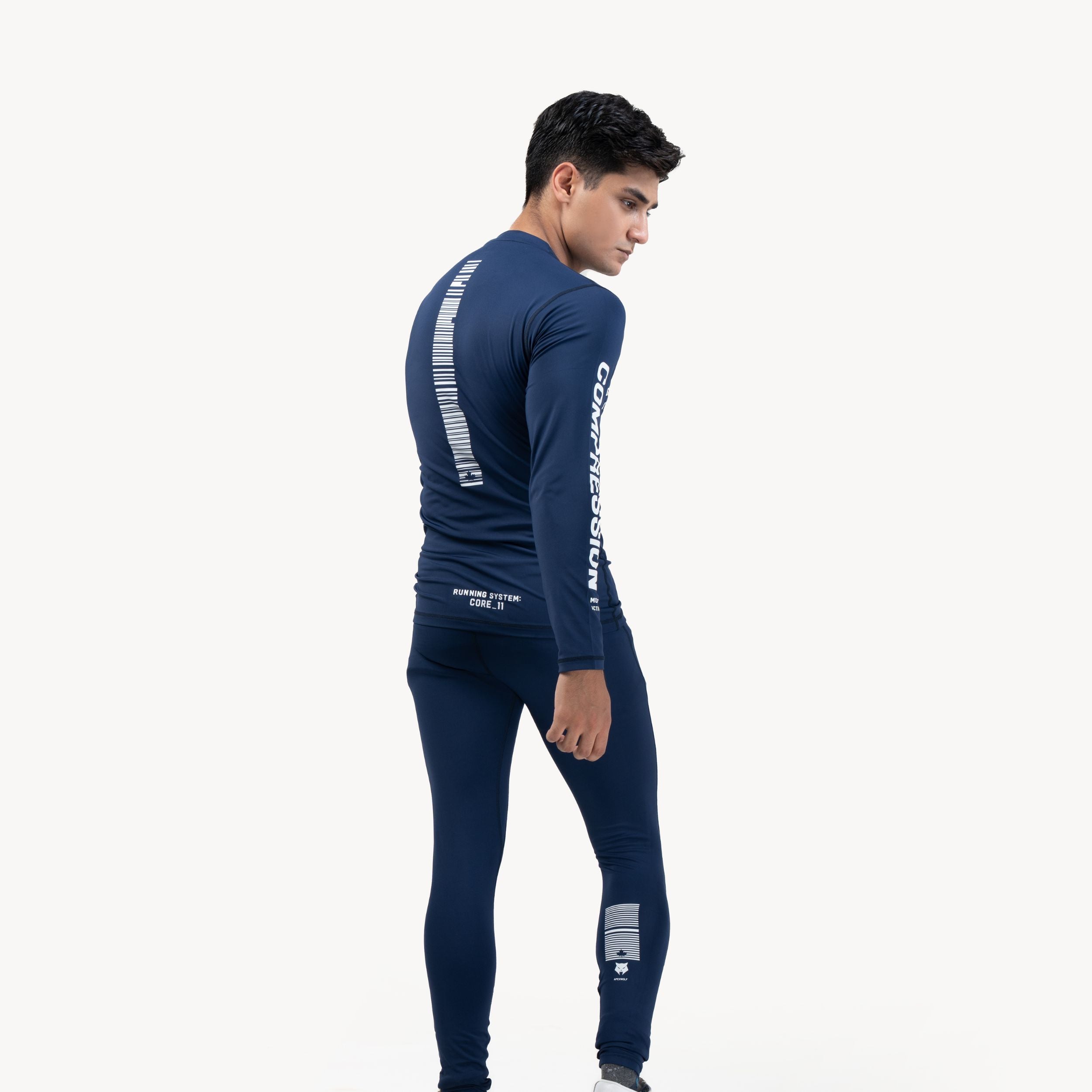 Ironsync_11 - Shadow Navy — Back angle, navy compression set showing barcode spine graphic and COMPRESSION sleeve text