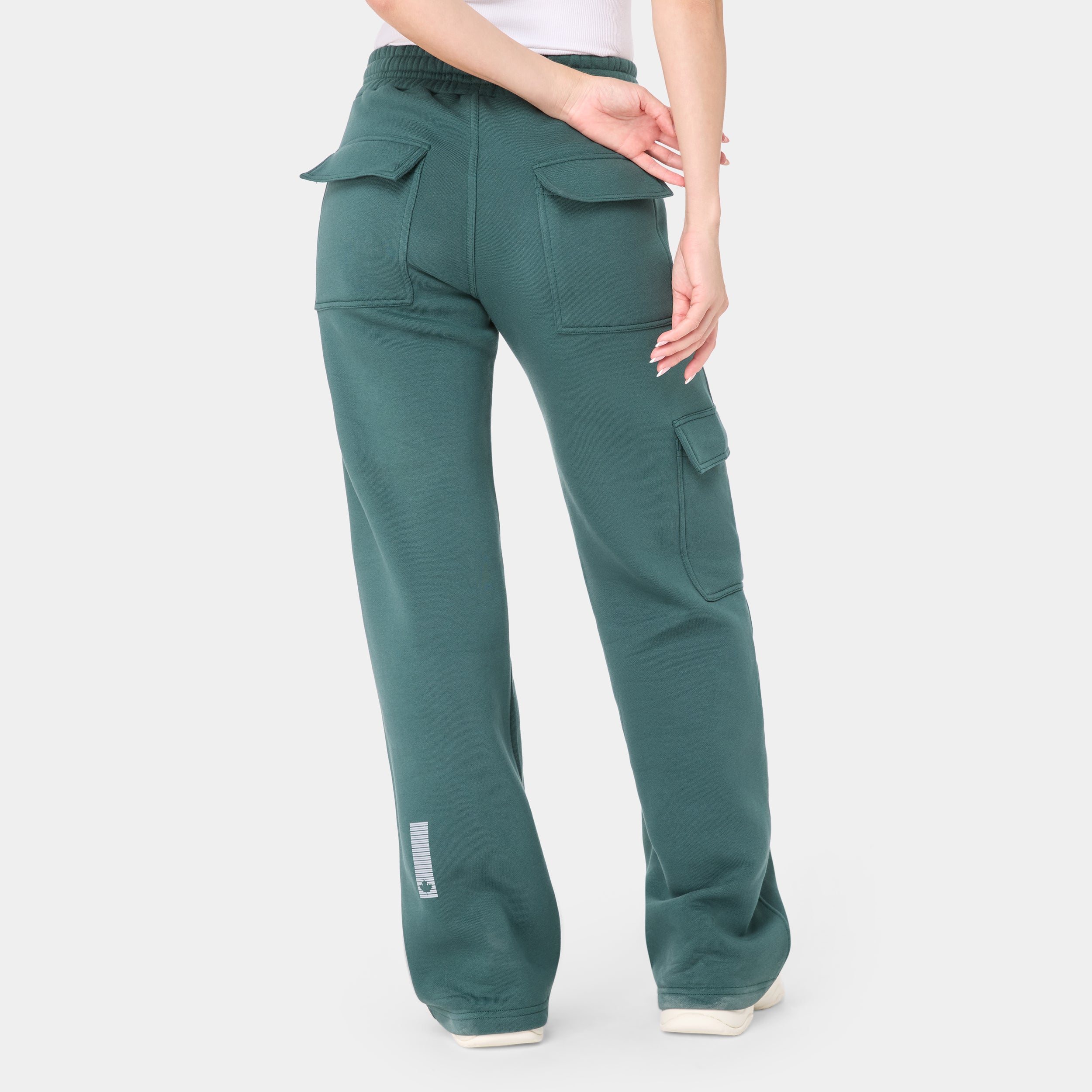 ALPHAFIRE BOTTOM — IRON FOREST — Rear ¾ angle, teal cargo sweatpants with flap back pockets and barcode calf detail