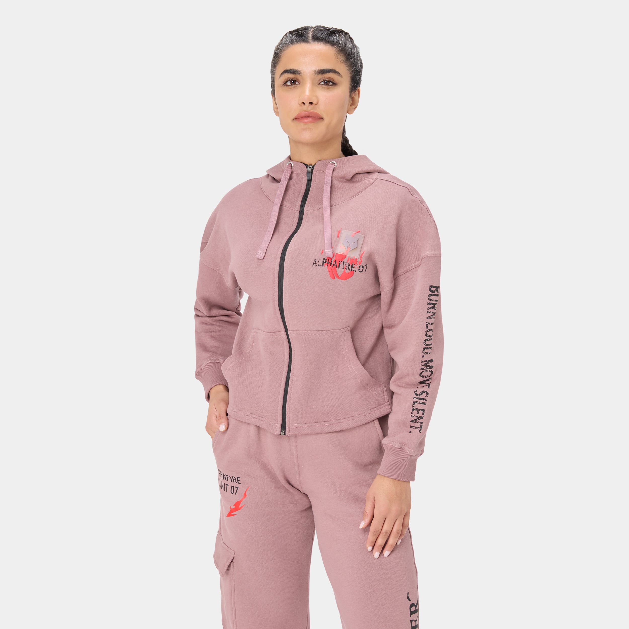 ALPHAFIRE CROP HOODIE — STORM ROSE — Front standing view torso to mid-thigh, dusty pink tracksuit with Alphafire 07 chest