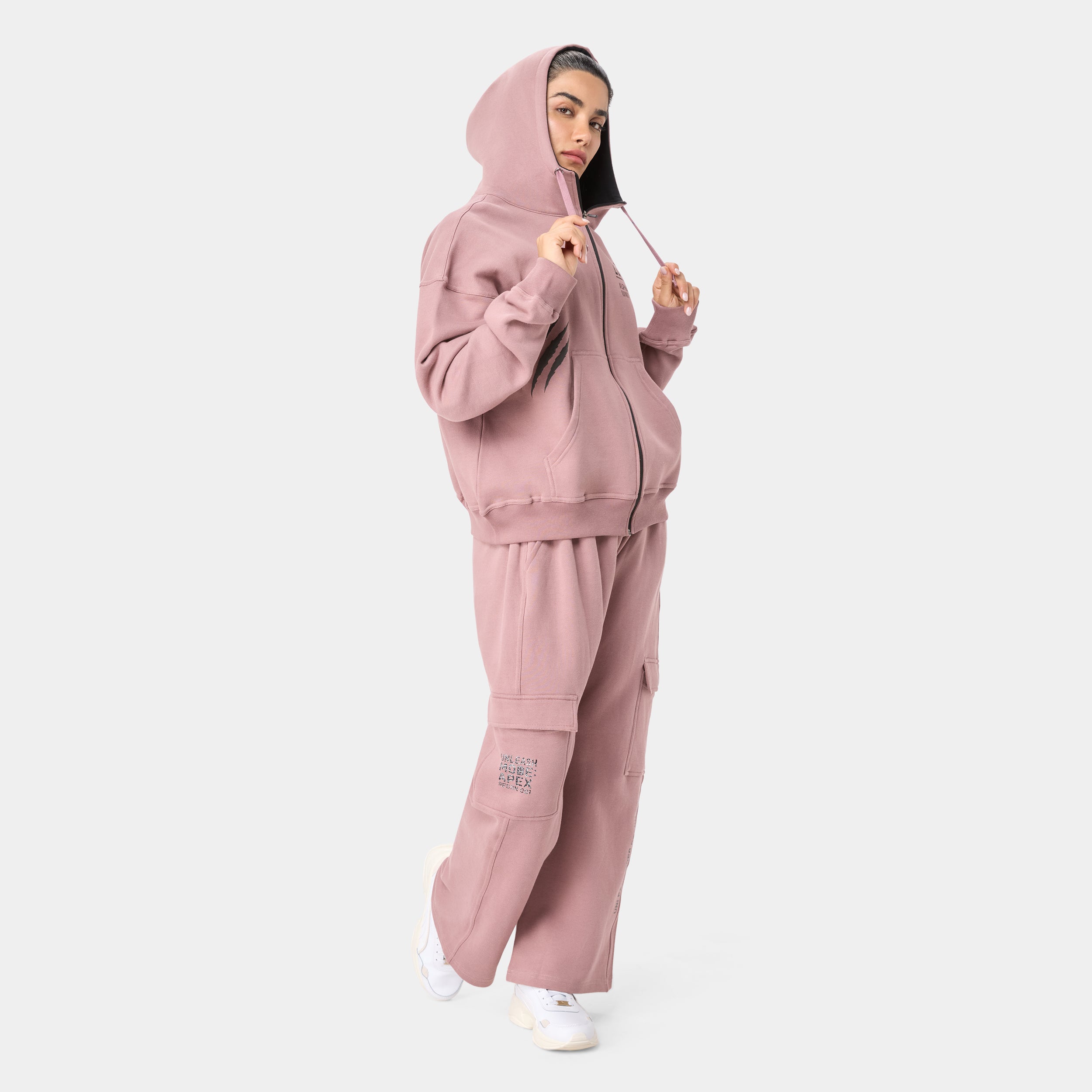 LOCKFEM_05 HOODIE — STORM ROSE — Full-body side view, dusty pink zip hoodie and matching wide-leg cargo pants with hood up,