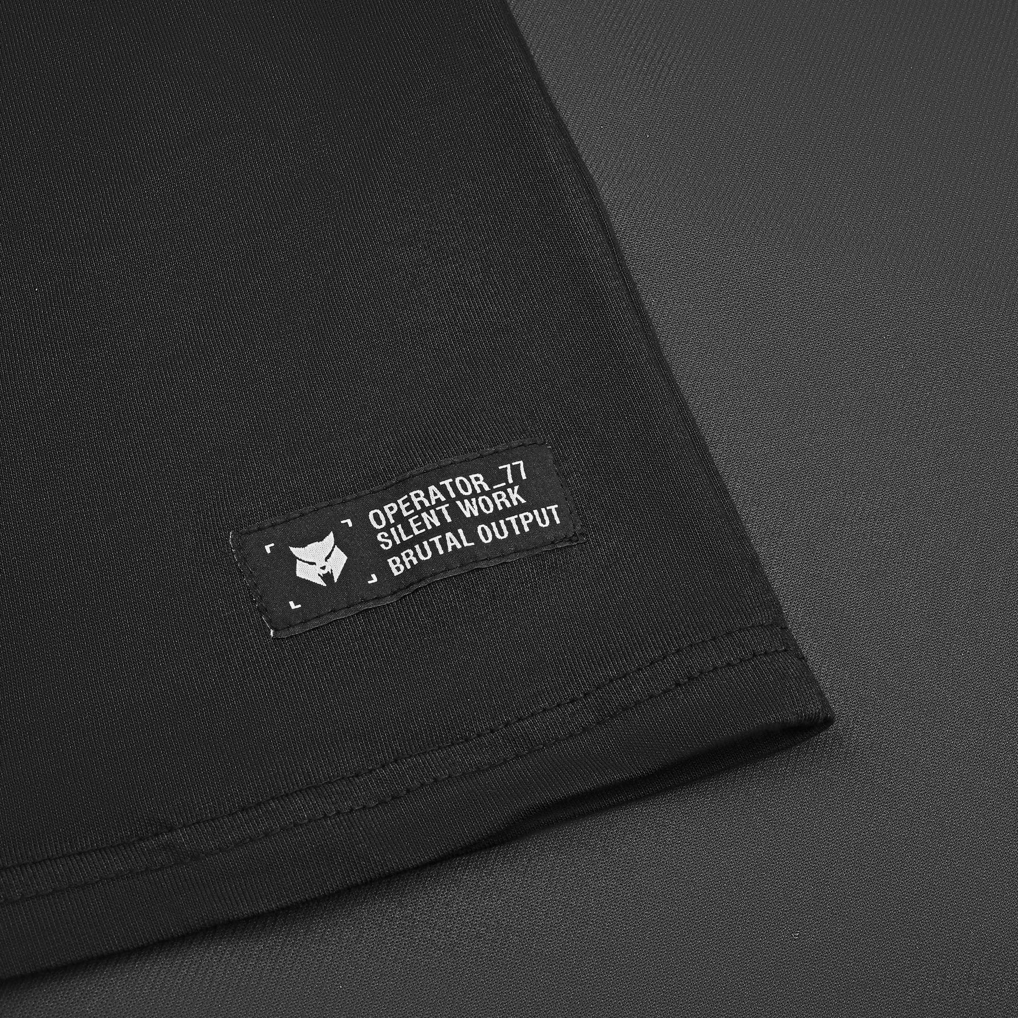 OPERATOR_77 OVERSIZED TEE — WAR BLACK