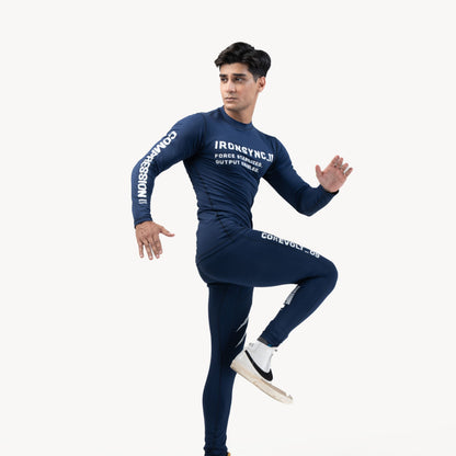 Ironsync_11 - Shadow Navy — Front angle, dynamic running pose in full navy compression set with white sneakers