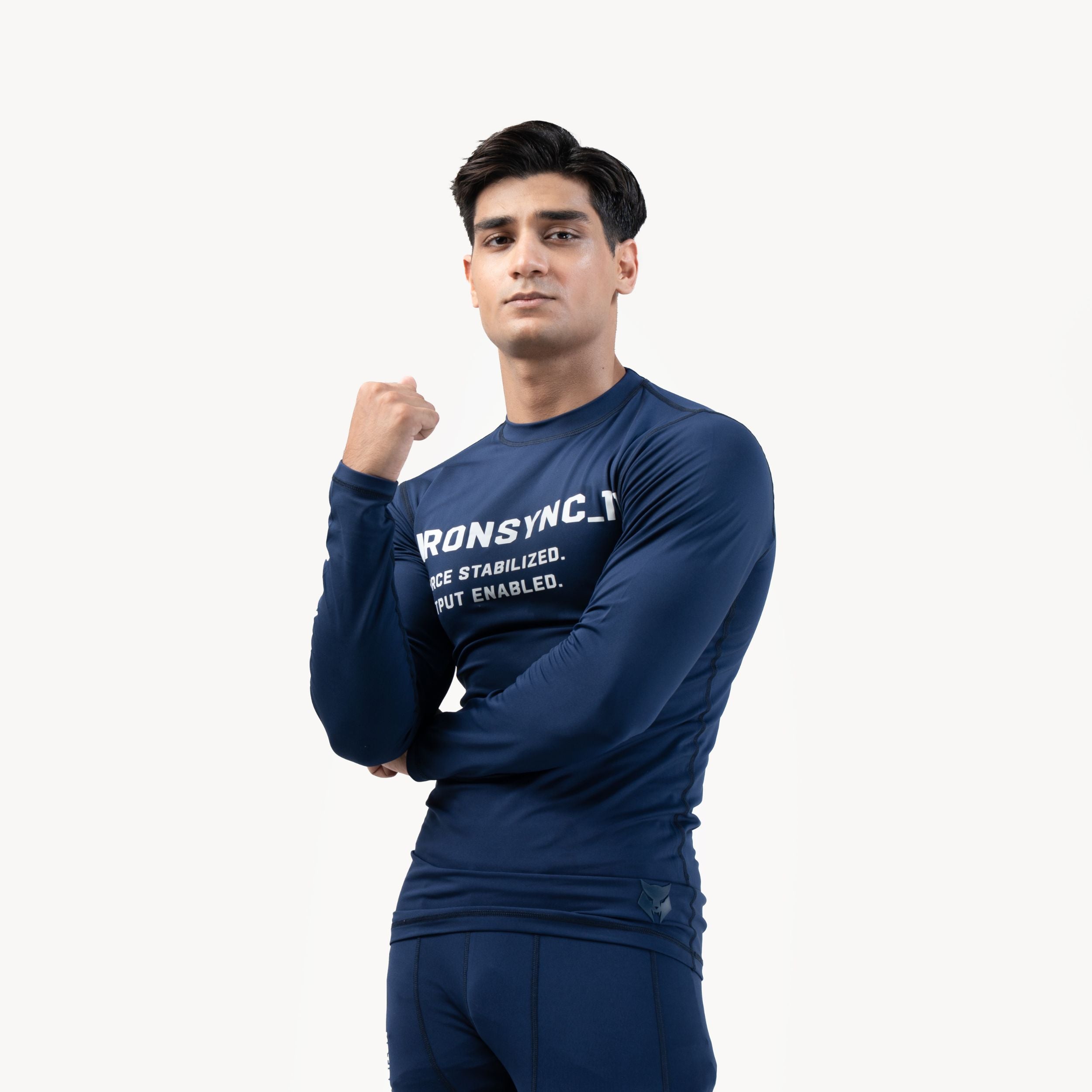 Ironsync_11 - Shadow Navy — Front/side close-up, navy compression top with fist pose showing IRONSYNC_11 text