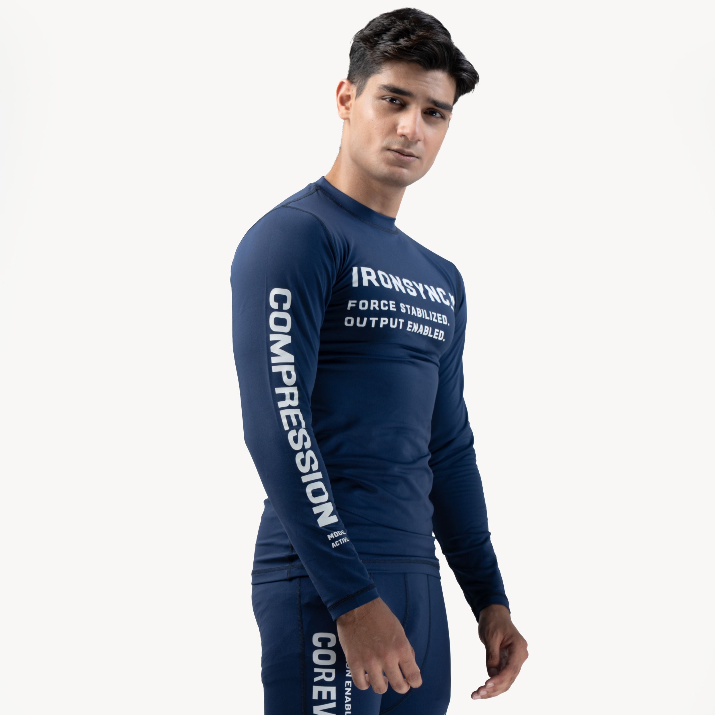 Ironsync_11 - Shadow Navy — Side/front angle, navy compression top close-up showing IRONSYNC_11 chest text and COMPRESSION s
