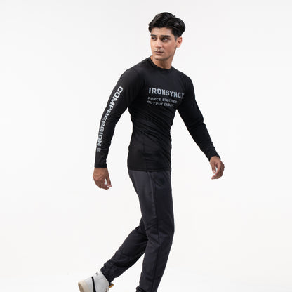 Ironsync_11 - war black — Full-body walking pose ¾ angle, COMPRESSION sleeve text with dark pants and white sneakers
